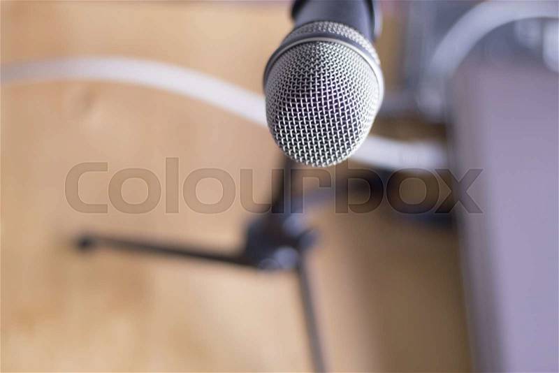 Home studio audio recording vocal studio microphone on stand to record singing or speaking voice, stock photo