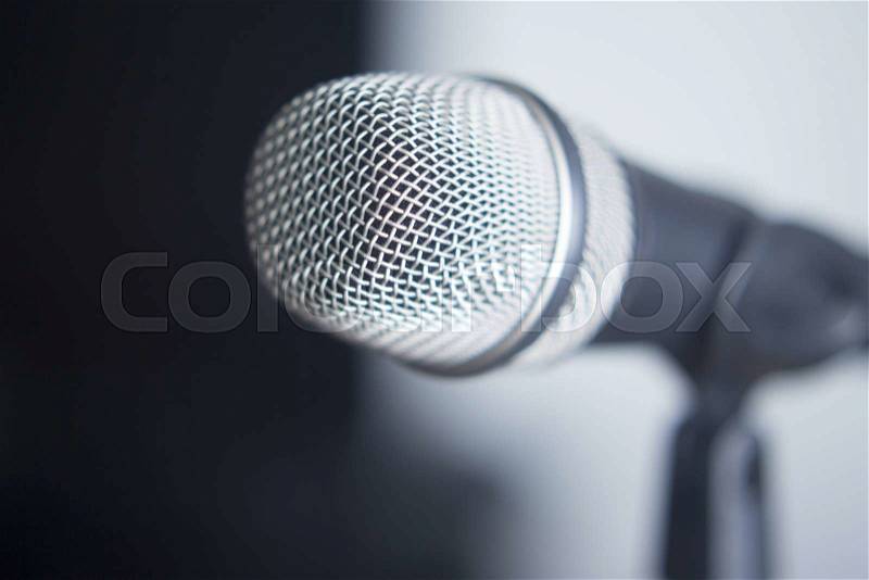 Audio recording vocal studio professional microphone on stand to record singing or speaking voice, stock photo