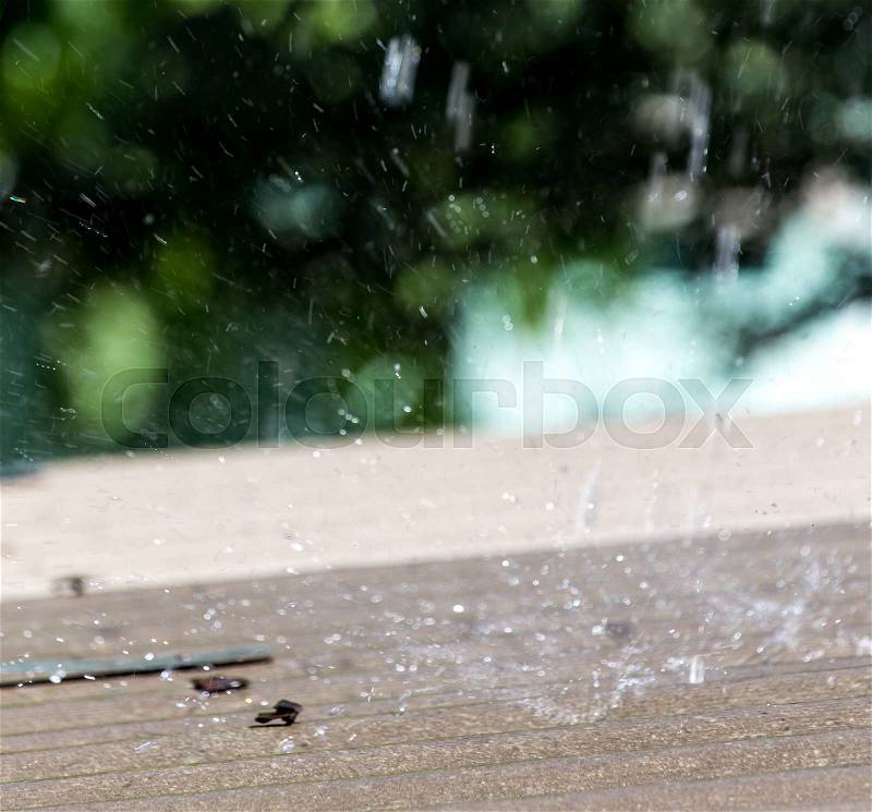 Storm rain on the roof of the house, stock photo