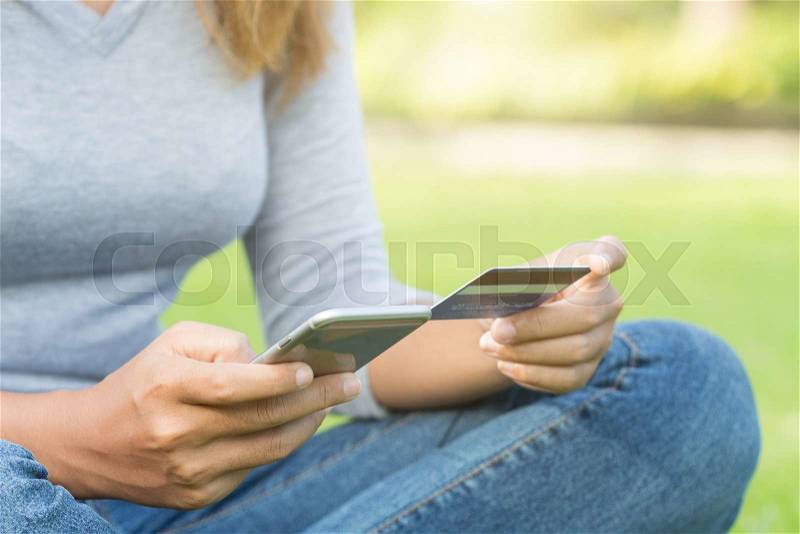 Women holding phone and credit card purchase shopping online, stock photo