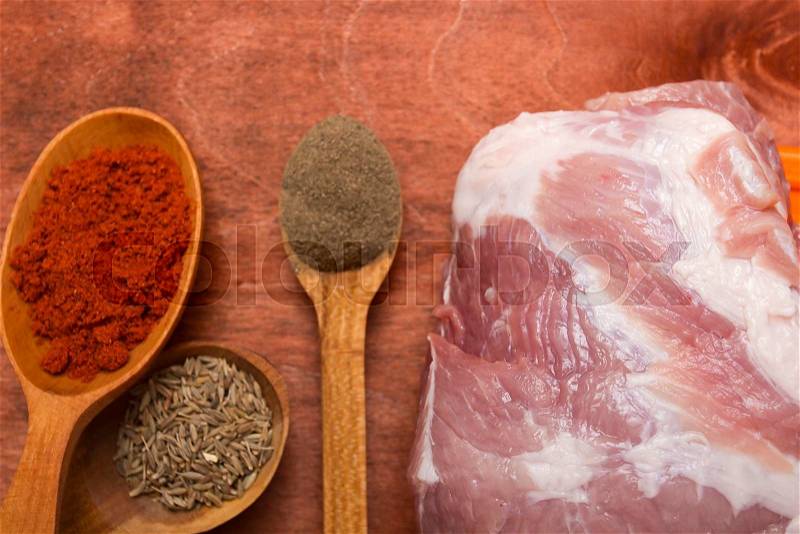 Set of spices for cooking meat on the kitchen table surface, stock photo