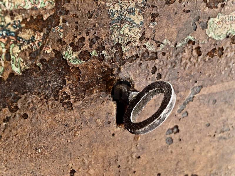 Background old brown rusty keyhole with key, stock photo