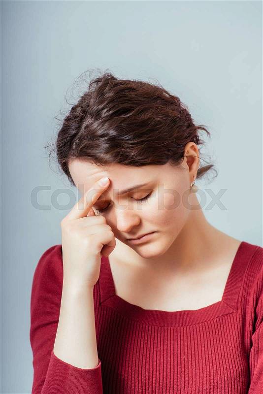 Woman thinking, trying hard to remember something, stock photo