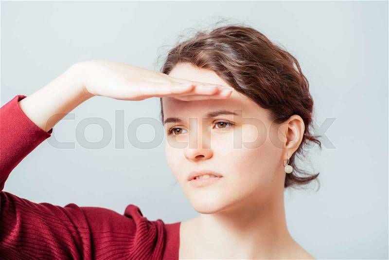Girl looks into the distance, stock photo