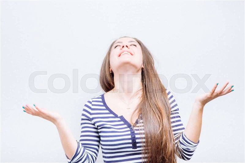 Woman prays to God, stock photo