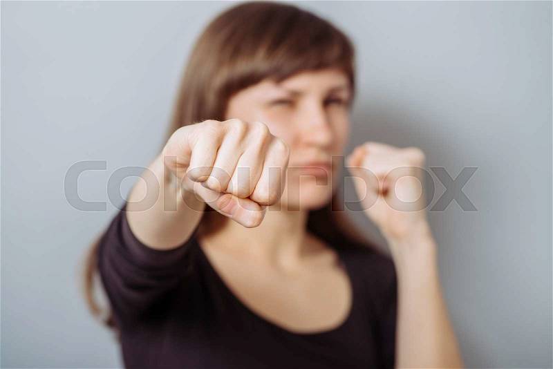 The woman - a feminist defends his position in office, stock photo