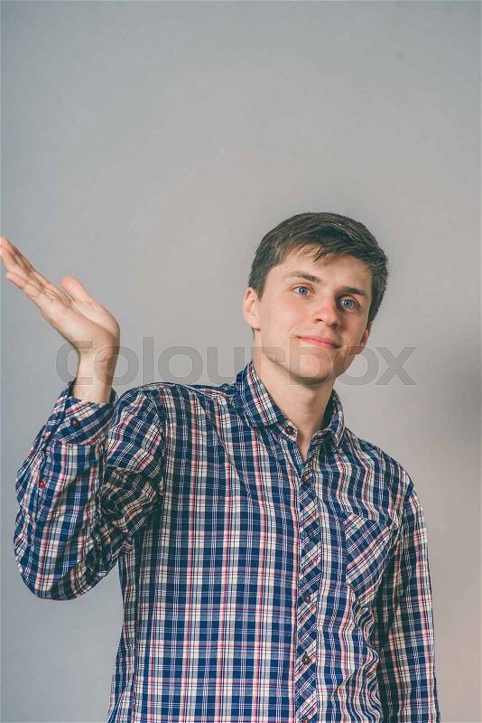 Man holding something invisible, stock photo