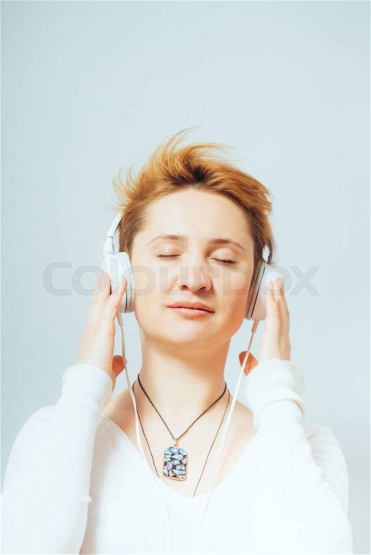 Girl listen music headphone, stock photo