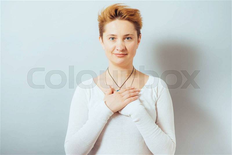 Woman folded her arms, stock photo