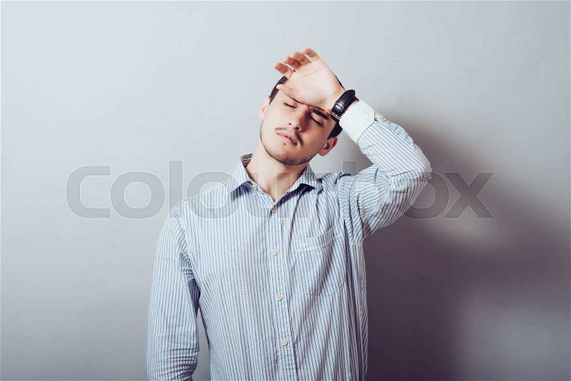 Man was very tired at the office work, stock photo