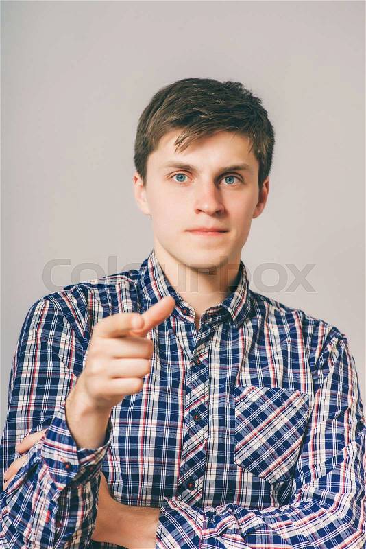 Man pointing at the camera, stock photo