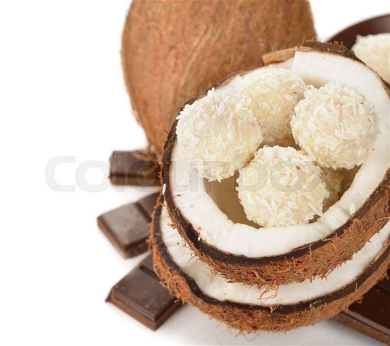 Coconut and coconut candies on a white background, stock photo