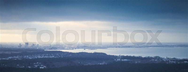 Panoramic skyline of Tallinn city, Baltic sea coast, Estonia. Blue tonal correction photo filter effect, stock photo