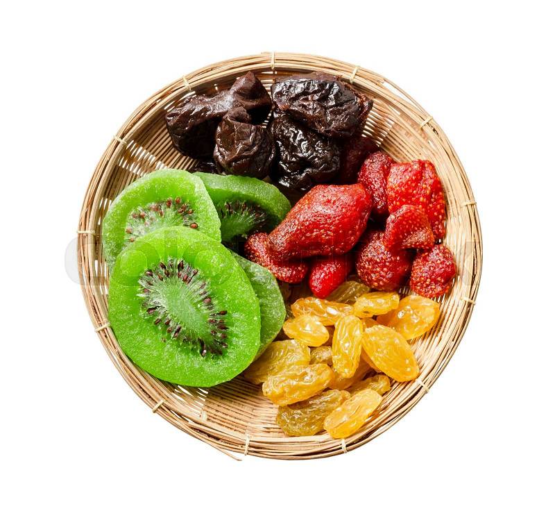 Mix dried fruit in weave wooden basket on white background. , stock photo