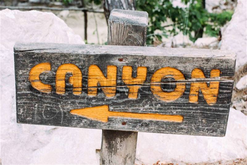 Wooden plaque with the inscription pointer Canyon. The National Park Canyon Goynuk, Turkey, stock photo