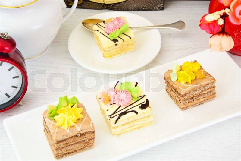 Sweets: Cream Cakes on Plate. Studio Photo, stock photo