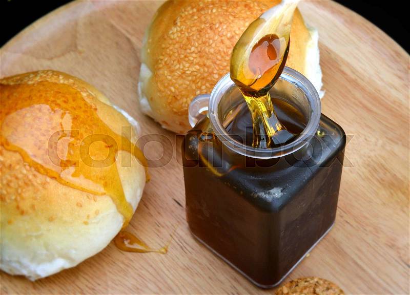 Sticky of sweet honey and breads ready to serv, stock photo