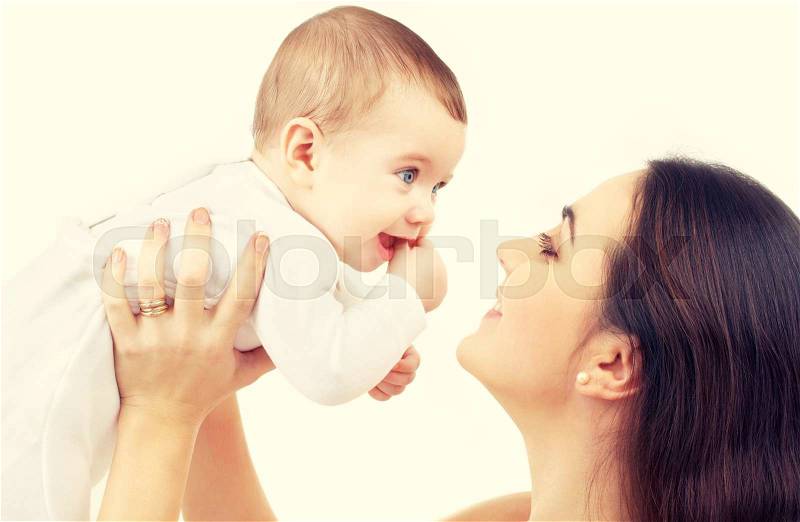 Family and happy people concept - baby and mother, stock photo