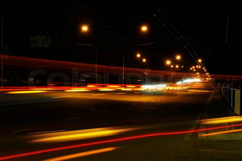 Night road in the city with car the light trails , stock photo