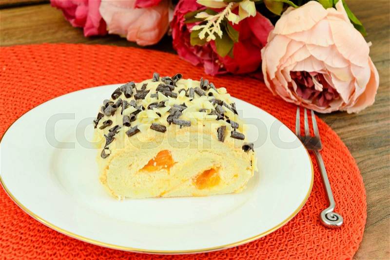 Biscuit and Cake with Mandarin and Whipped Cream. Studio Photo, stock photo