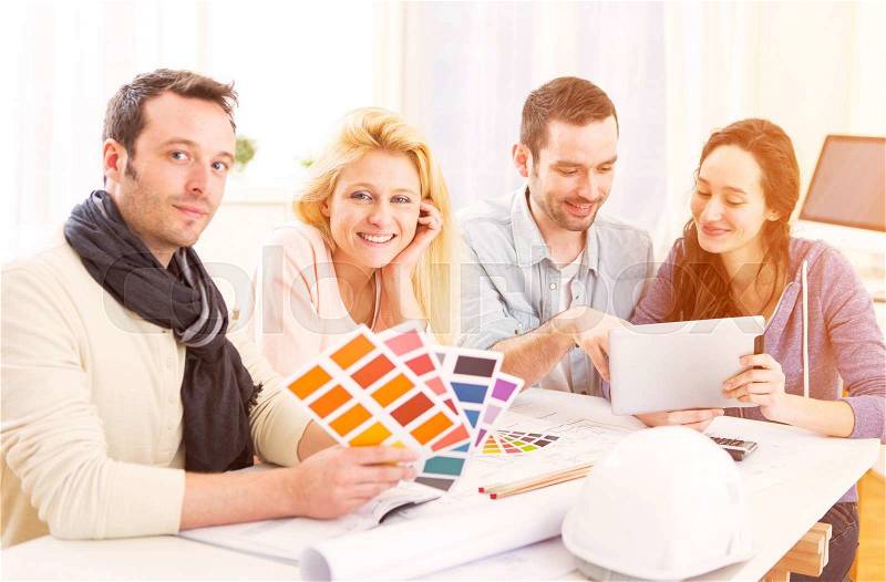 View of a Architect students choosing colors for their project, stock photo