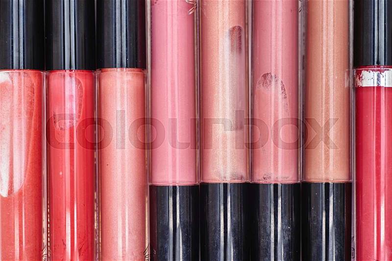A studio close up of cosmetic lip gloss, stock photo