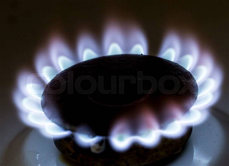 Blue flame of natural gas fire as the background, stock photo