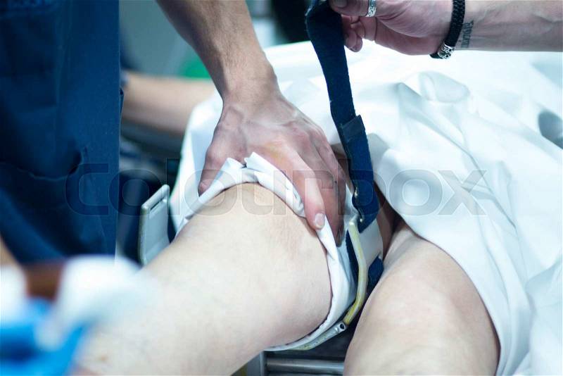 Hospital knee surgery arthroscopy orthopedic operation in emergency operating room photo, stock photo