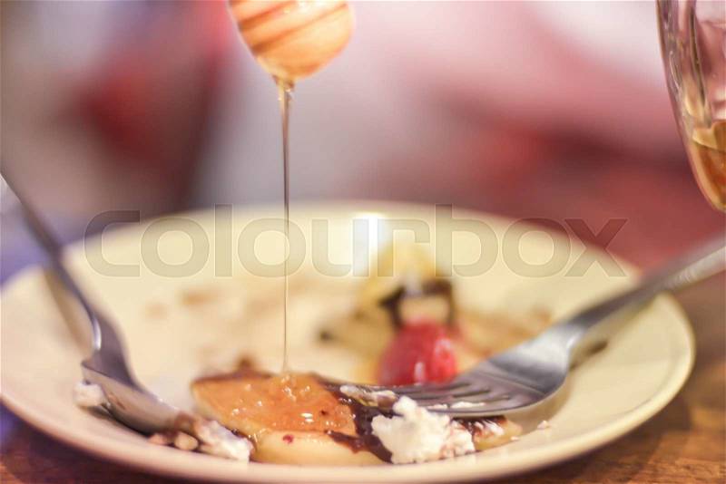 Ice cream and pancake for dessert with honey, stock photo