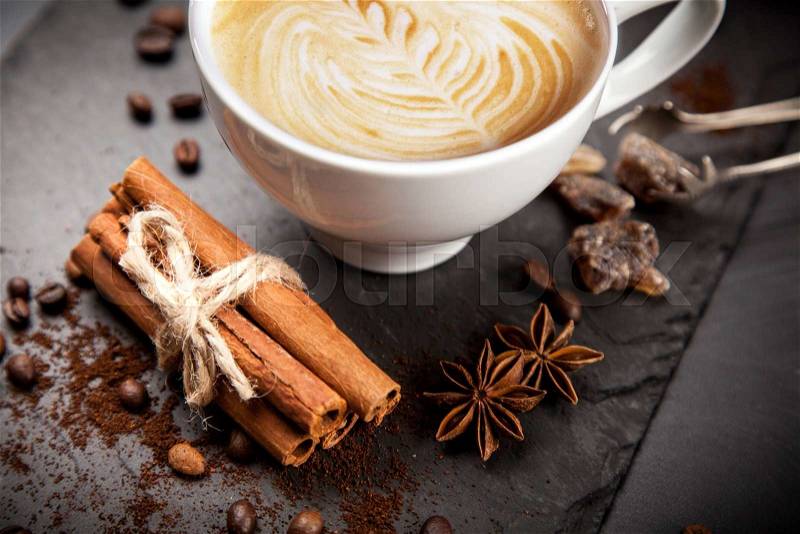 Cup of hot coffee on stone board, stock photo
