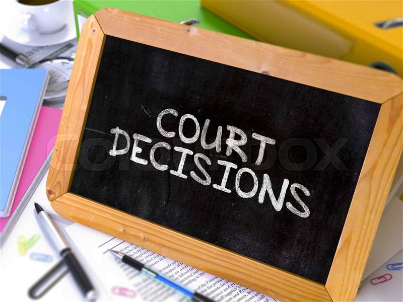 Handwritten Court Decisions on a Chalkboard. Composition with Chalkboard and Ring Binders, Office Supplies, Reports on Blurred Background. Toned Image, stock photo