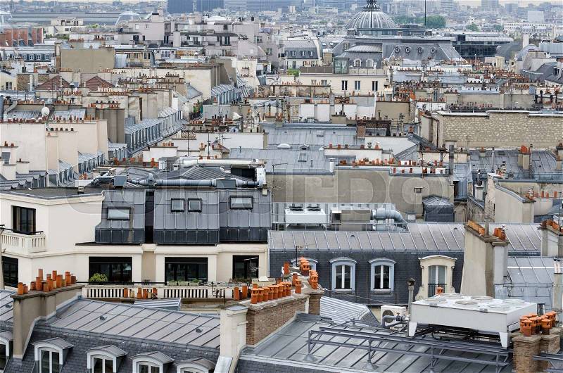 Rooftop of traditional buildings in Paris, France, stock photo