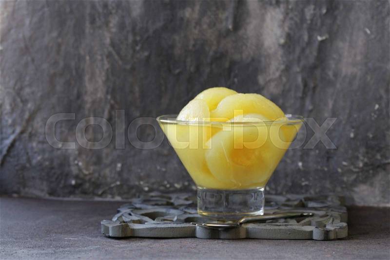 Canned yellow pears, natural organic dessert, stock photo