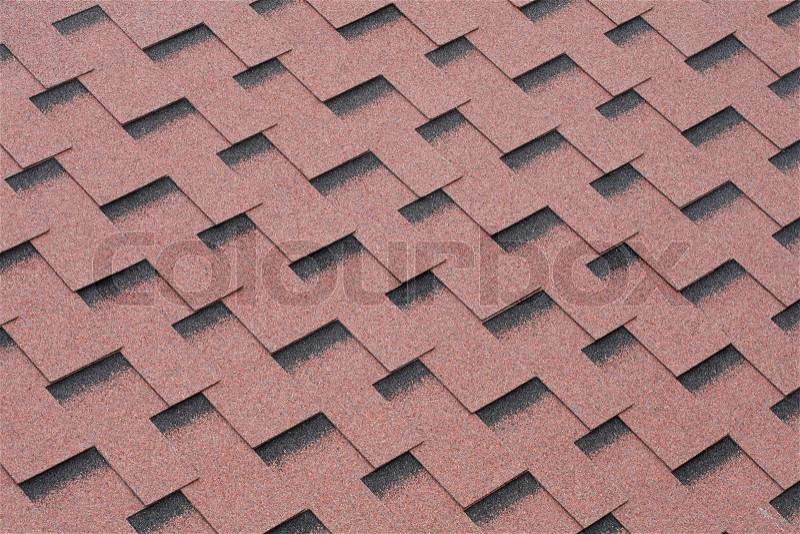 Red mineral felt roofing shingles texture, stock photo