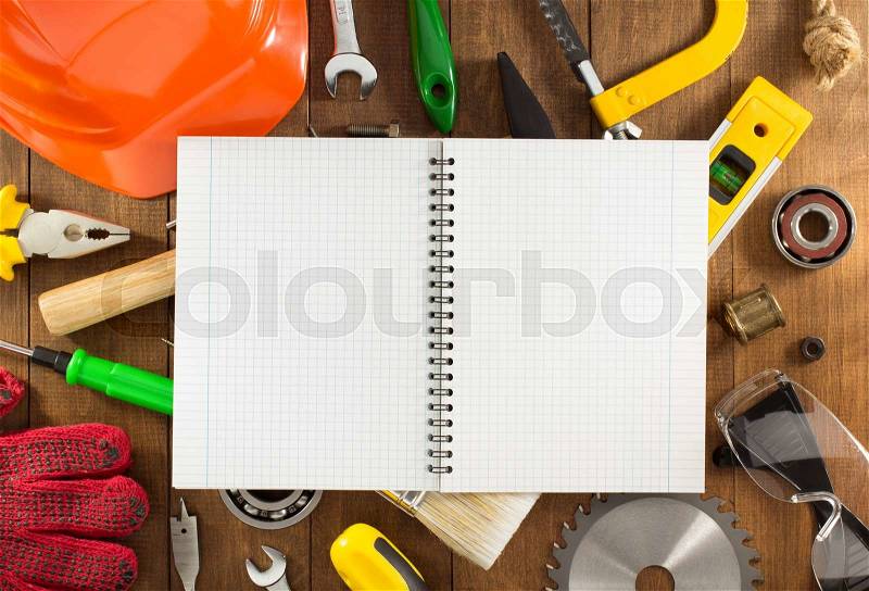 Work tools and instruments on wooden background, stock photo