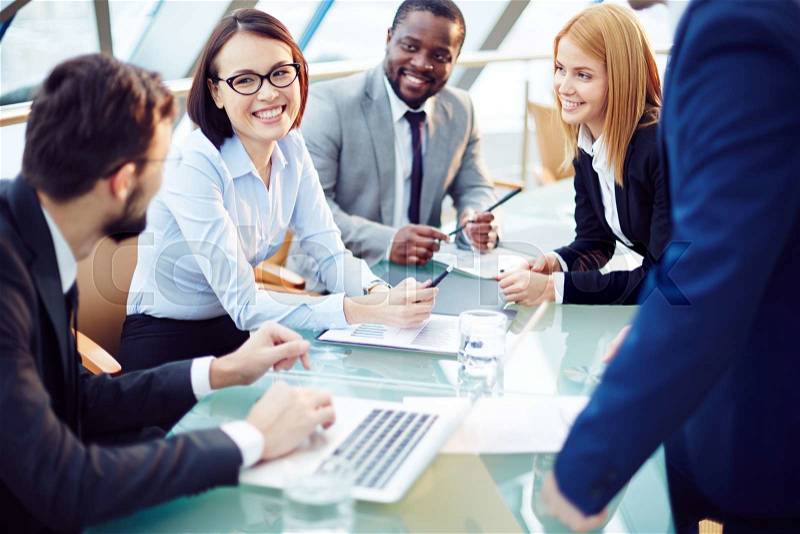 Business team discussing together business plans, stock photo