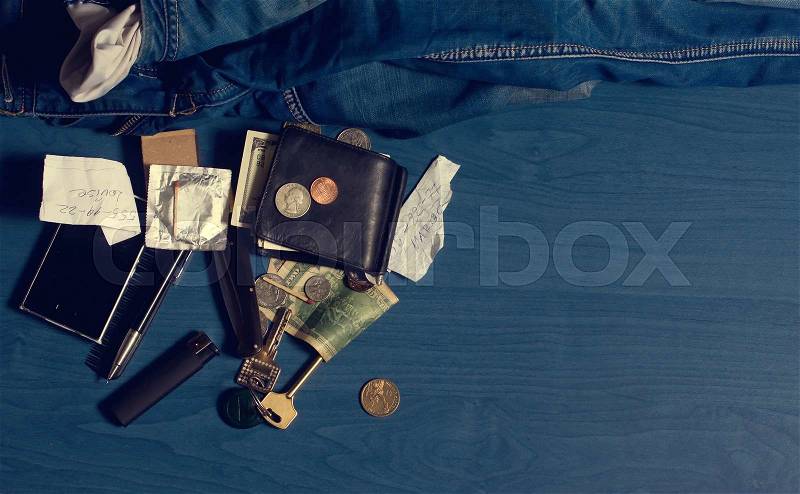 The contents of the pockets of men jeans, it is possible to check his wife. Or at customs, stock photo