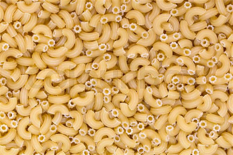 Raw pasta background close up, stock photo