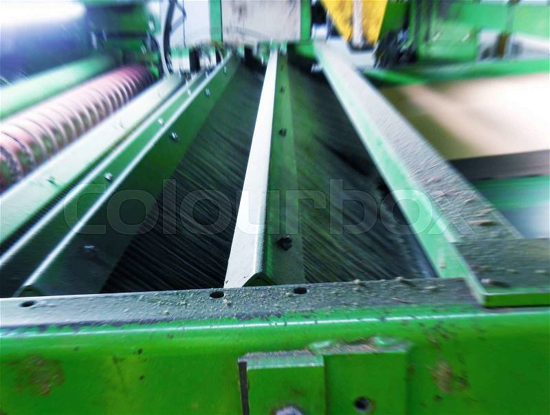 Blurred movement inside paper mill factory, stock photo