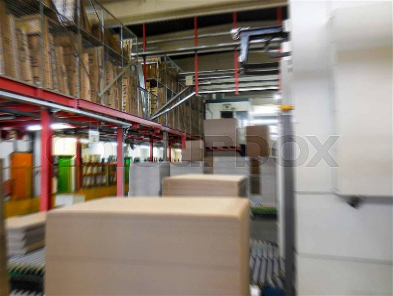 Blurred view of Paper Mill Warehouse. Movement and work concept, stock photo