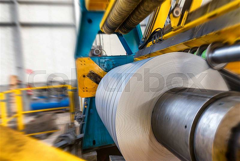 Metal coils machine. Interior of factory. Business concept, stock photo