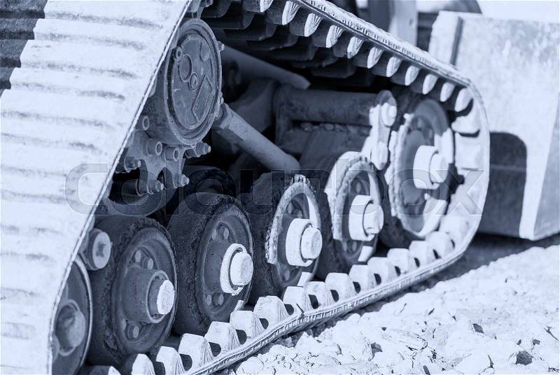 Construction machine track steel steel chains. Tank wheels excavator drive belt, stock photo