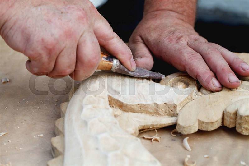A wood carvings, tools and processes work closeup, stock photo