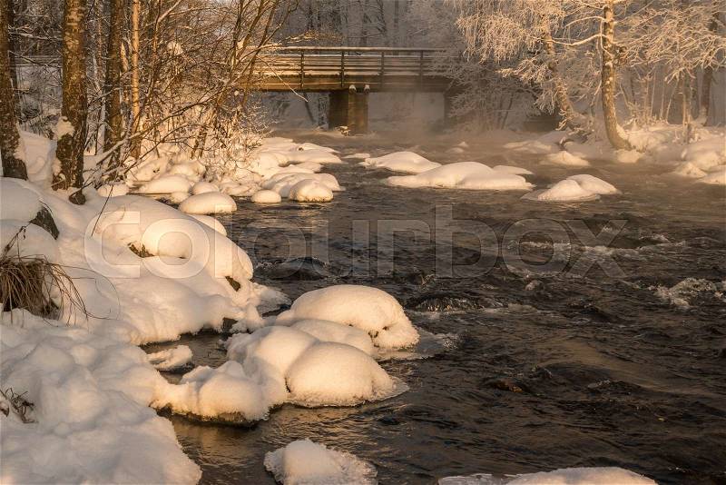 Winter stream and it is freezingly cold, stock photo