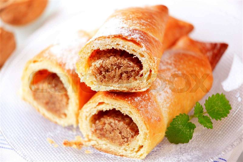 Sweet pastry rolls with nut filling, stock photo