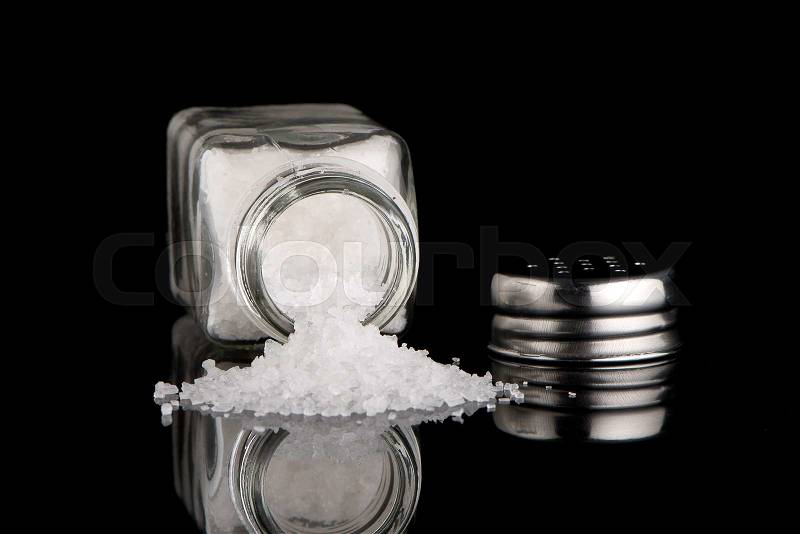 Salt shaker on black Background, stock photo