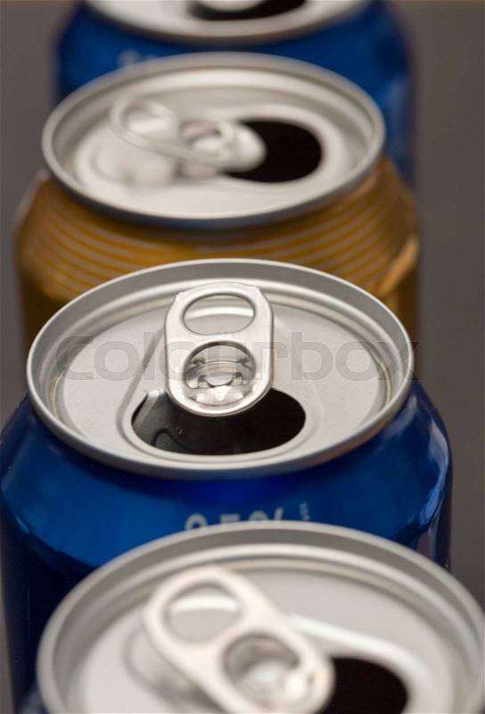 Opened Beer Cans in a row, stock photo