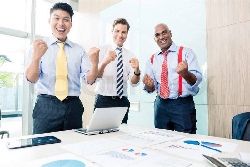 Indian CEO reporting success in business meeting, stock photo