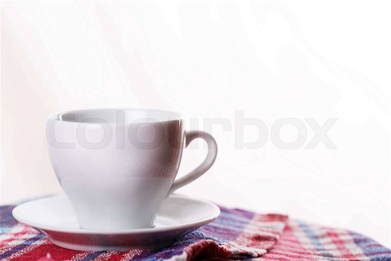 White mug saucer tea coffee plaid , stock photo