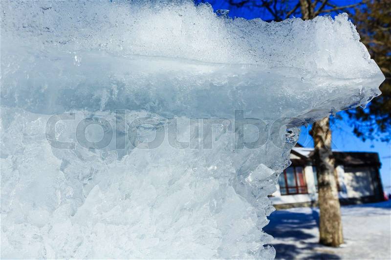 Melting glacial block of ice closeup, stock photo